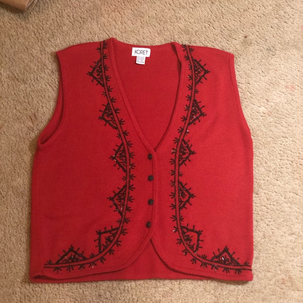 A red Koret sweater vest